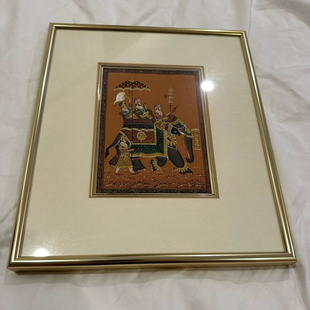 Vintage Hand Painting a Mughal ruler, riding an elephant with his servants